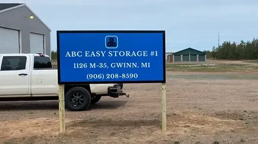 ABC Easy Storage #1 signage in front of maintenance truck and building
