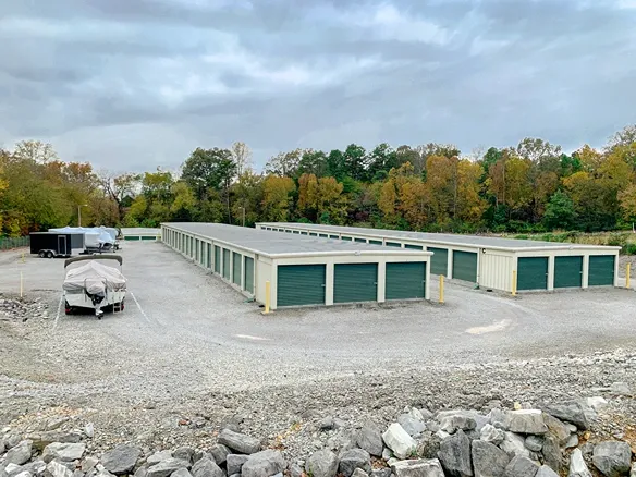 Exterior of outdoor storage units and vehicle storage at Volunteer Storage Loudon facility.
