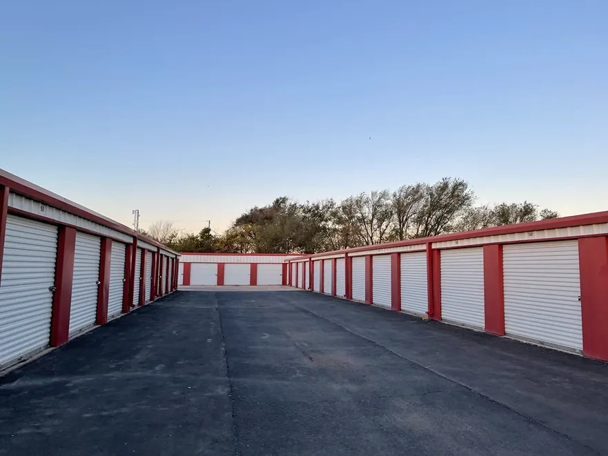 Exterior of outdoor storage at MRC Self Storage facility with paved roads.