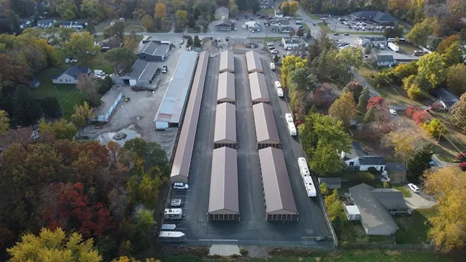 View of fenced perimeter and paved driveway at Lambertville Mini Storage Secor.