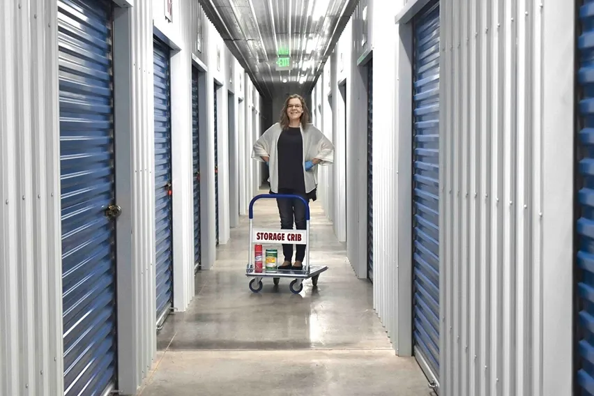 Storage Crib management team member in the hallways of climate-controlled facility