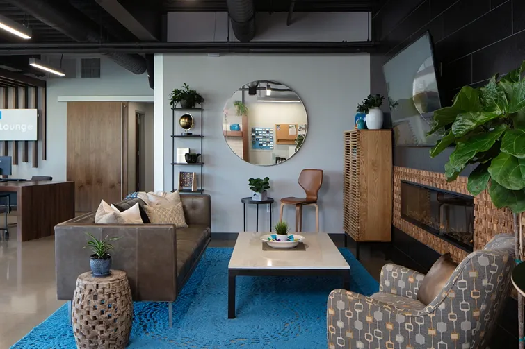 Comfortable lounge space with chairs and decor at Storage Lounge.
