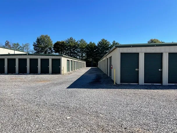Exterior view of unit buildings and paved lanes at Volunteer Storage Tellico Village.