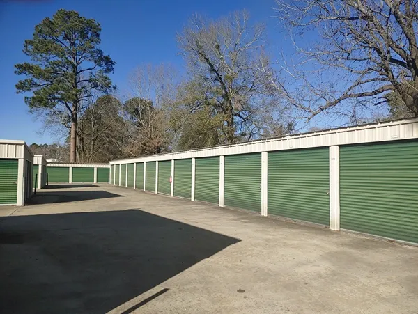 Drive-up storage units with wide paved lanes at Town and Country Self Storage.