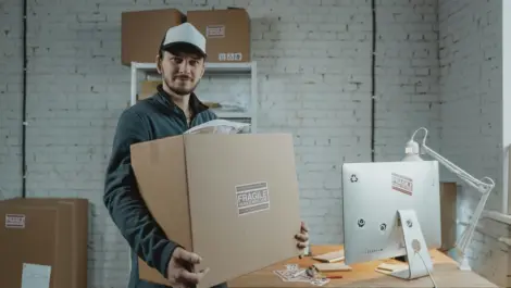 Man carrying storage box.