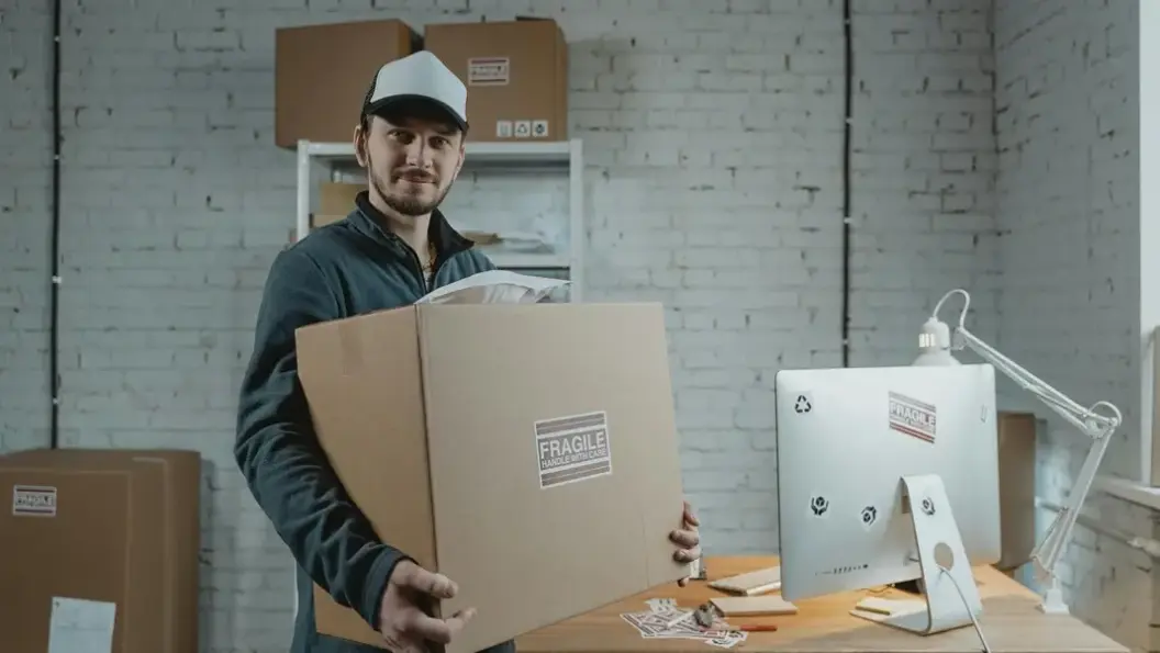 Man carrying storage box.