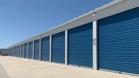 Facility signage and front entrance at Speedway Storage.