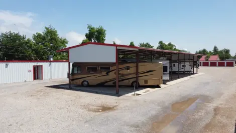 View of covered vehicle storage at North Texas Self Storage facility.