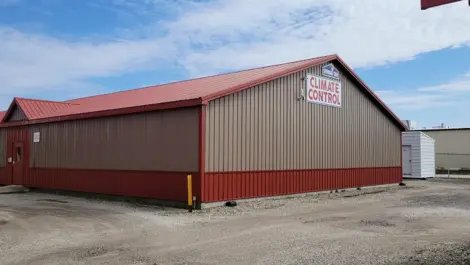 Wide access lanes and storage unit doors at Storage Crib.