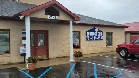 Clean roll-up doors and bright exterior at Storage Crib.