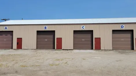 Covered entryway and building facade at Storage Crib.