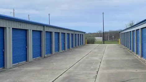 View of Storage Crib West section with adjacent parking and unit access.