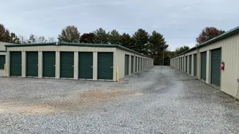 Front entrance of Volunteer Storage Tellico Village with signage and secure gate.