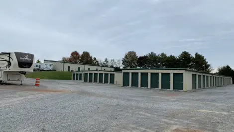Front entrance of Volunteer Storage Tellico Village with signage and secure gate.