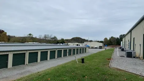 Open lot with drive-up units and vehicle parking at Volunteer Storage Tellico Village.