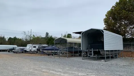 Clean gravel lanes and unit rows at Volunteer Storage Tellico Village.