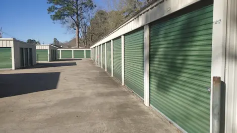 Exterior View of Town and Country Self Storage with gated entrance and signage.