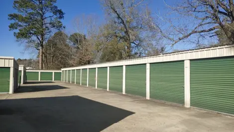 Drive-up storage units with wide paved lanes at Town and Country Self Storage.