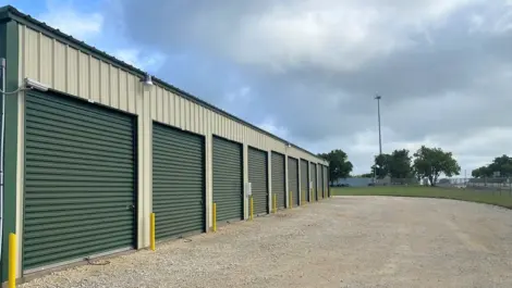 Wide driveways and rows of storage units at Trio Self Storage.