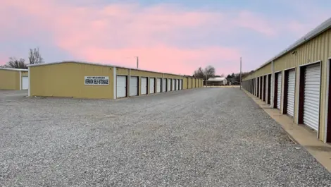 Entrance area with keypad gate and fencing at Vernon Self Storage.