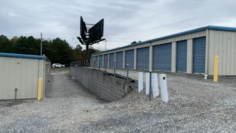 Entrance to Volunteer Storage Vonore with facility sign and gated access.