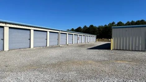 Secure entrance with keypad access and fencing at Volunteer Storage Vonore.