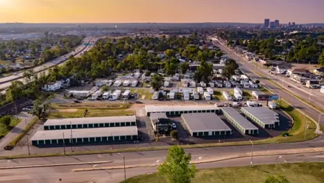 Drive-up storage units with roll-up doors and paved access at Wagner Ford Self Storage.