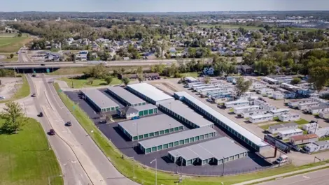 Fenced facility with multiple unit rows at Wagner Ford Self Storage.