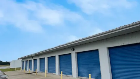 Exterior of outdoor storage units at Woodridge Mini Storage facility.