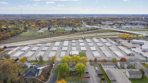 Drive-up storage units with roll-up doors and paved lanes at Osprey Storage Howard.
