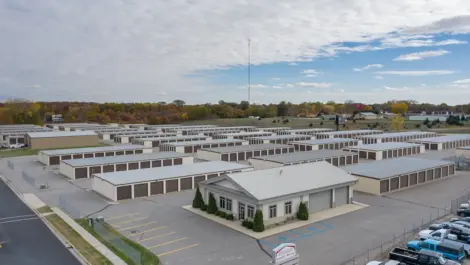 Clean facility grounds and drive-up unit row at Osprey Storage Howard.
