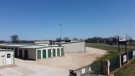 Wide driveways and rows of storage units at Trio Self Storage.