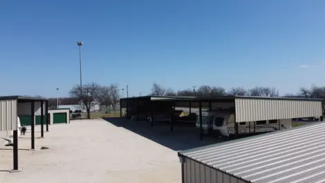 Wide driveways and rows of storage units at Trio Self Storage.