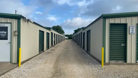 Trio Self Storage units and aisle between