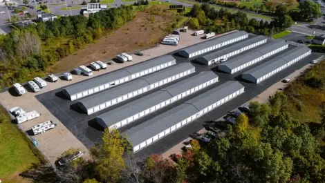 Aerial view of rows of storage units and vehicle storage at Osprey Storage Shaver.