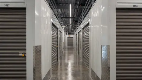 Modern interior with storage access and camera surveillance at Storage Lounge.