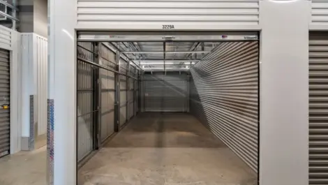 Modern interior with storage access and camera surveillance at Storage Lounge.