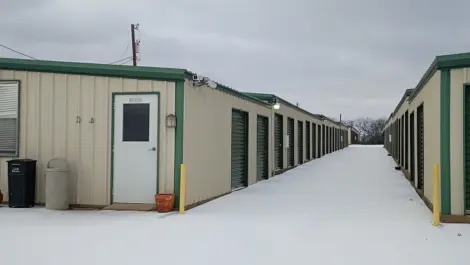 Wide driveways and rows of storage units at Trio Self Storage.